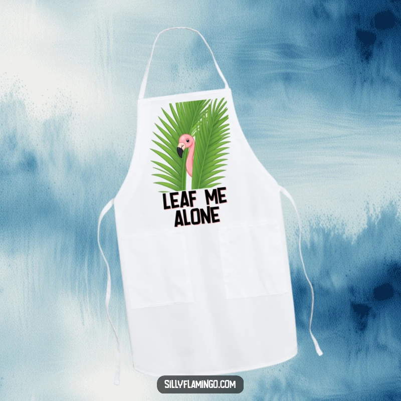 Funny flamingo peeking from a green palm leaf on a durable apron, perfect for adding humor to kitchen activities.