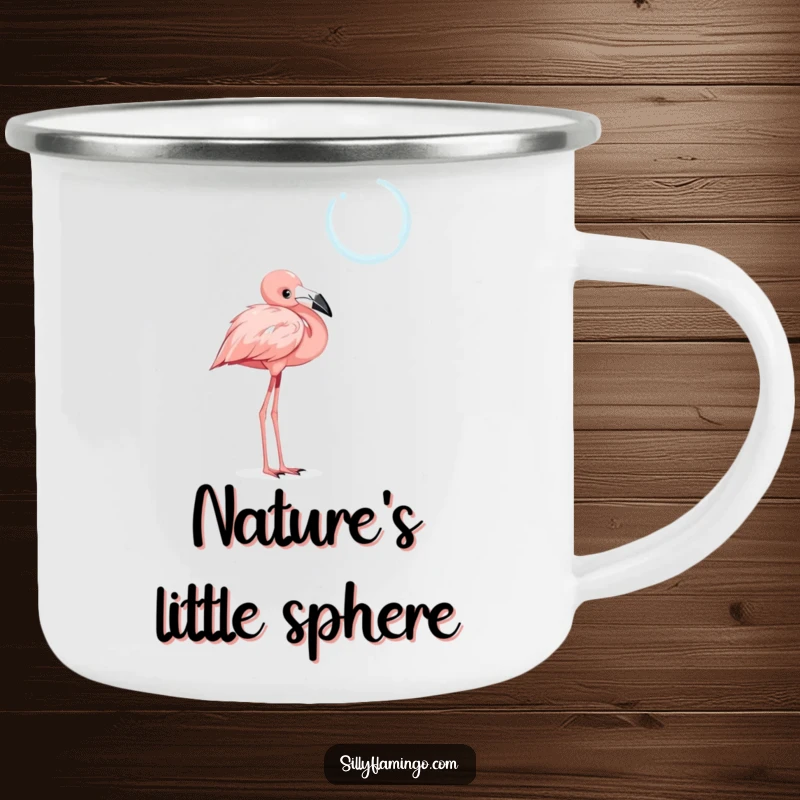 Funny camping mug featuring a curious flamingo character with a tilted head, observing a shimmering, floating bubble, perfect for outdoor musings.