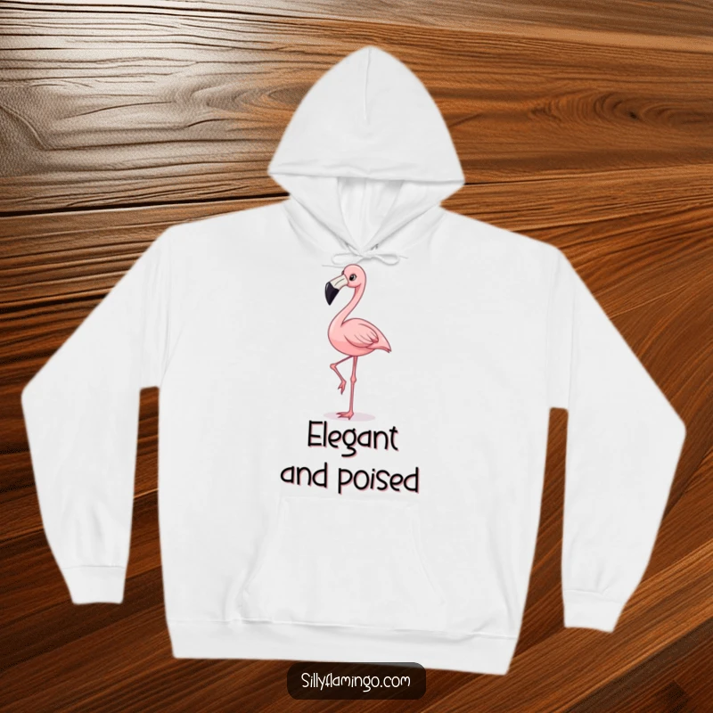 Funny hoodie showcasing a happy flamingo character with a wide grin, maintaining perfect balance on one leg.