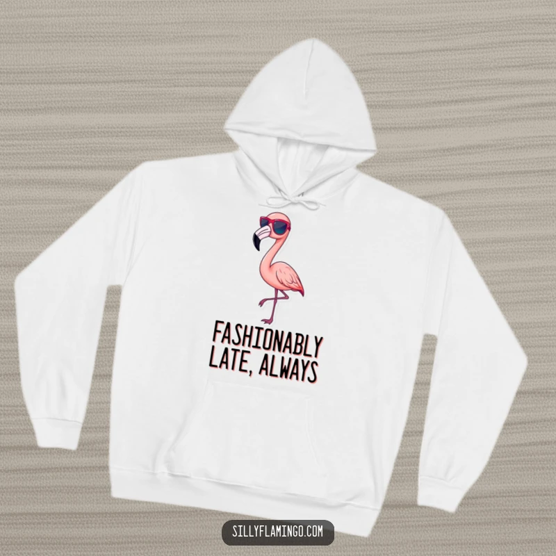 Funny pink flamingo hoodie, wearing tiny sunglasses and striking a chic pose, looking effortlessly cool, a warm funny gift.