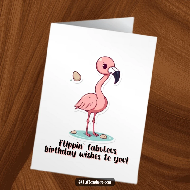 Funny Free Printable Birthday Card: Pink flamingo tossing a shiny pebble with its beak, looking playful and mischievous.