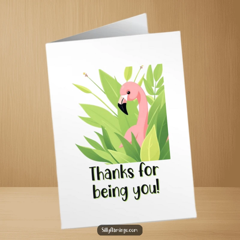 Funny Free Printable Thank You Card: A flamingo peeking from behind leaves, offering a humorous and heartfelt thank you.