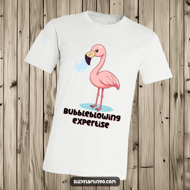 Funny flamingo t-shirt featuring a cheerful bird happily blowing a large bubble with its beak, full of whimsical fun.
