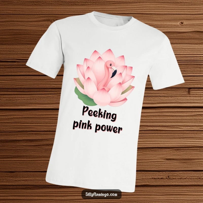 Funny t-shirt featuring a playful flamingo peeking from behind a giant, blooming lotus flower, showcasing a surprising and cute imagery.