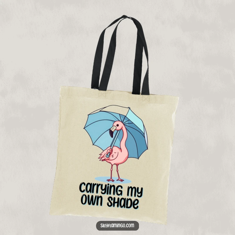 Funny kawaii flamingo tote bag depicting a cute bird comically balancing an umbrella, ideal for shopping and smiles.